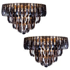 Pair of Spectacular Tiered Bronze and Smoked Rock Crystal Chandeliers