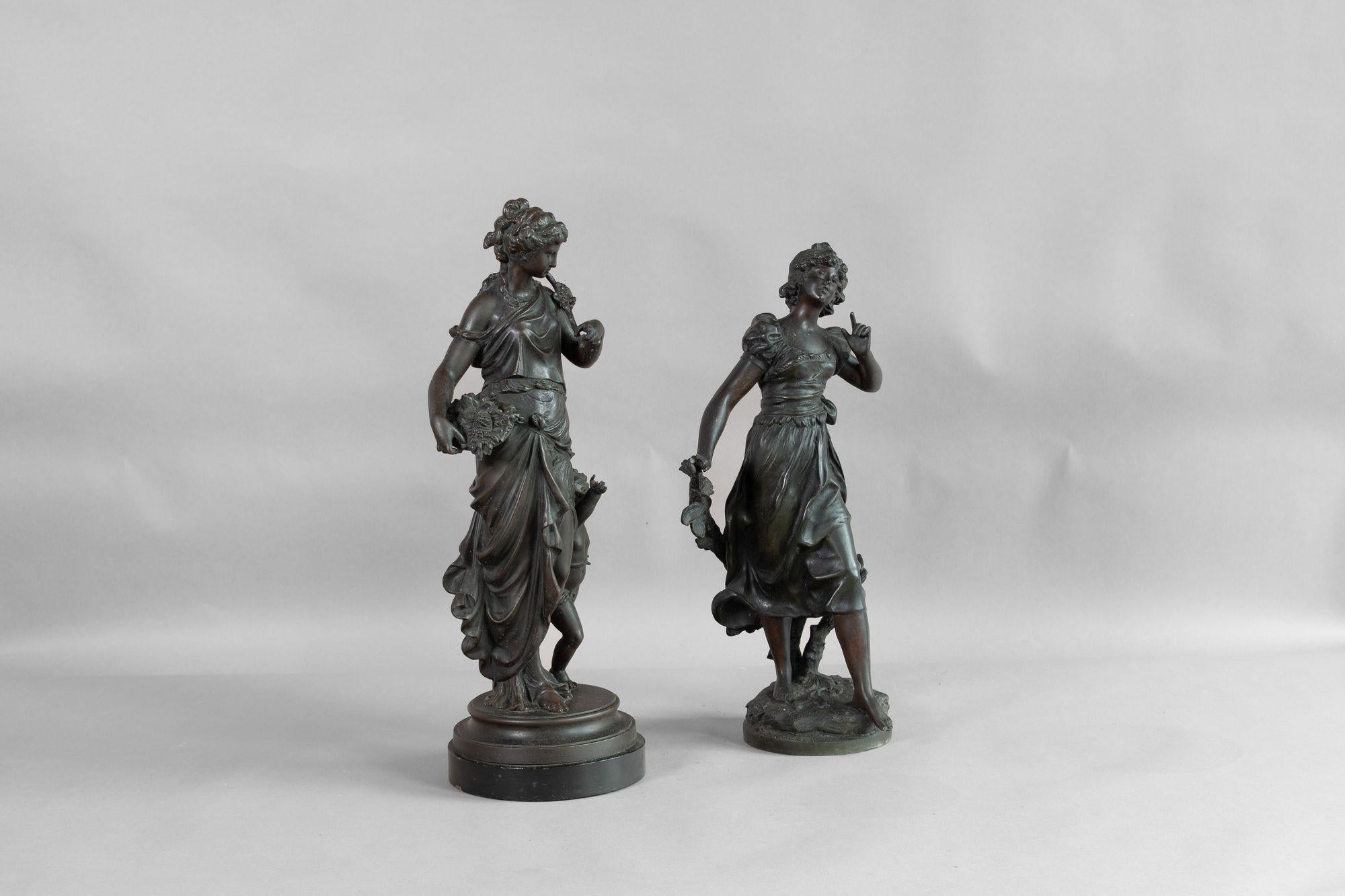 Pair of large spelters figures on bases. English circa 1900.

H 48cm x W 24cm x D 17cm