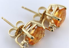 Pair of Spessartite Garnet, Diamond, 14k Gold Earrings