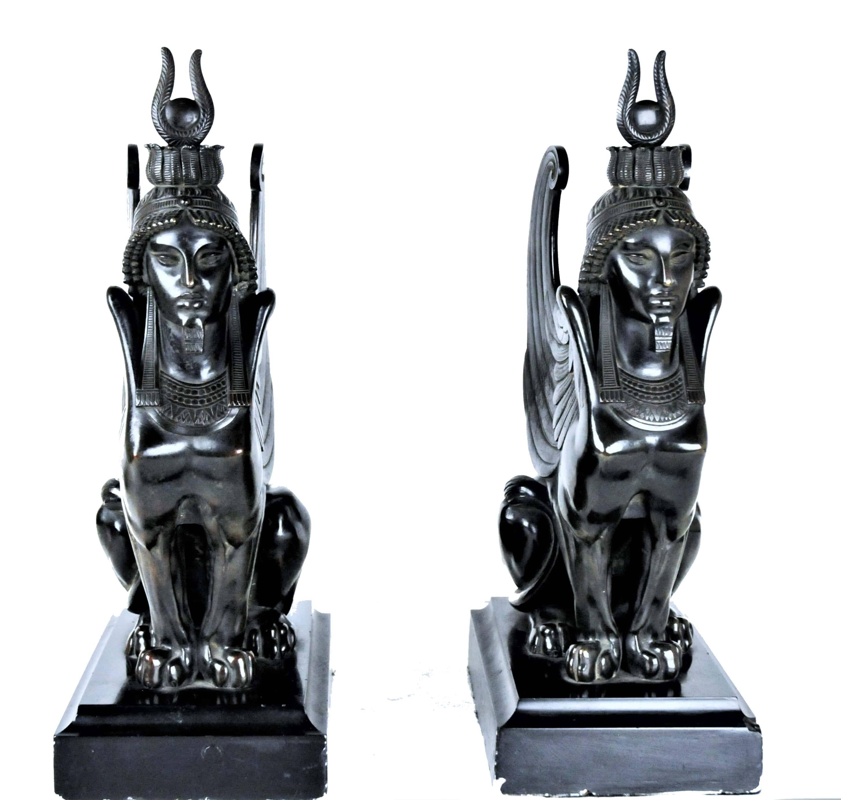 This wonderfully cast, outstanding pair of black-patinated bronze Sphinx of the museum-quality are mounted on their original painted plaster bases. 
 
Despite the fact that the sculptures are not signed, the finest exquisite workmanship and
