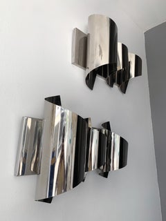 Paire d'appliques en métal chromé en spirale de Reggiani. Italie, 1970