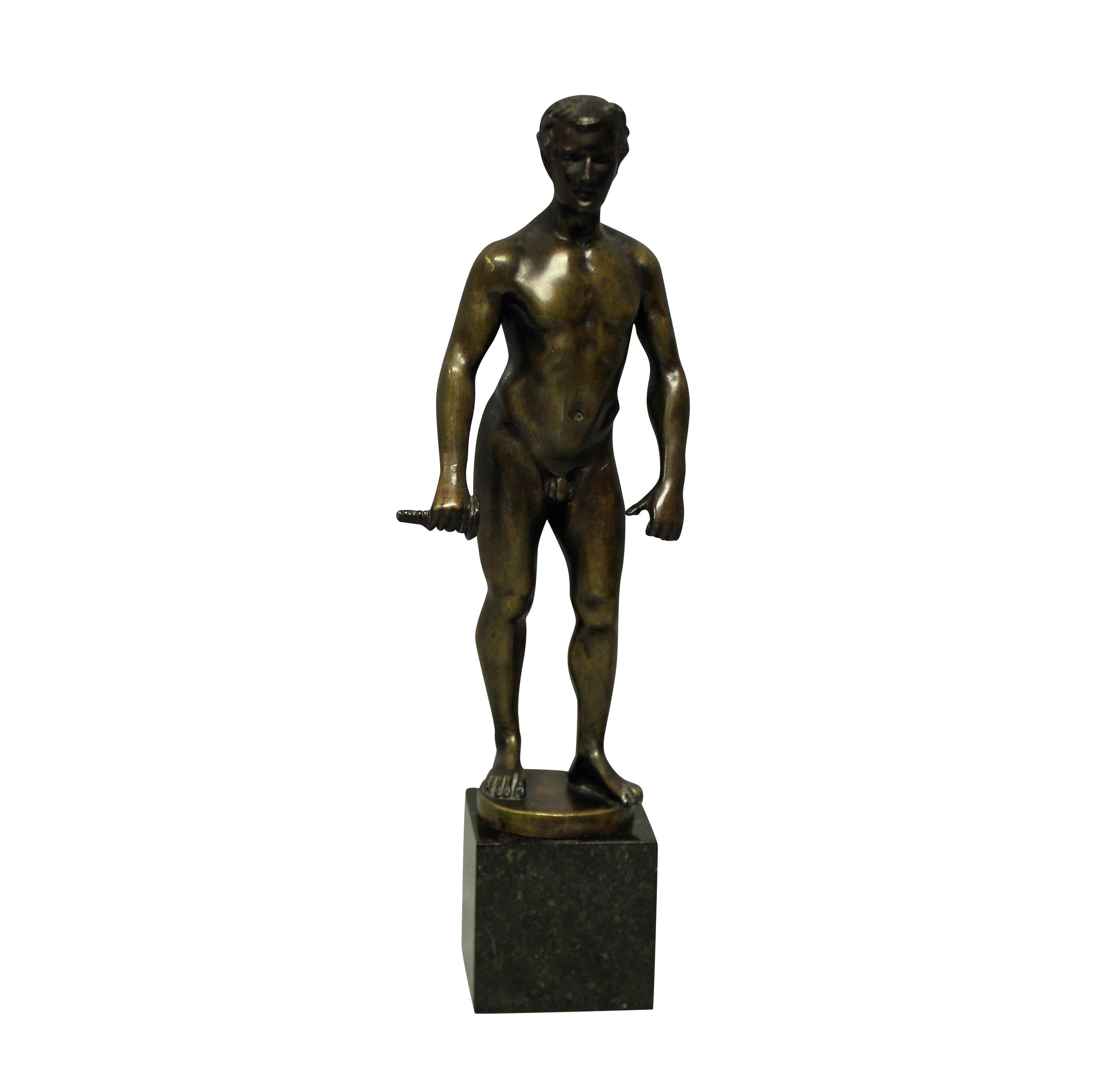 A pair of German bronze male nude figures by Spiro Schwatenberg (who died aged 24), on marble plinths. Signed. The sword blade is missing on one figure.