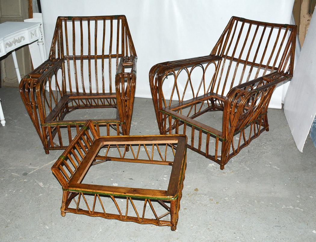 3-piece split reed seating set -- two club chairs & matching ottoman. This 1920s split reed set has been restored with a fresh coat of stain and varnish. The set would be perfect for porch, patio or family room.
Search terms: rattan, wicker, split