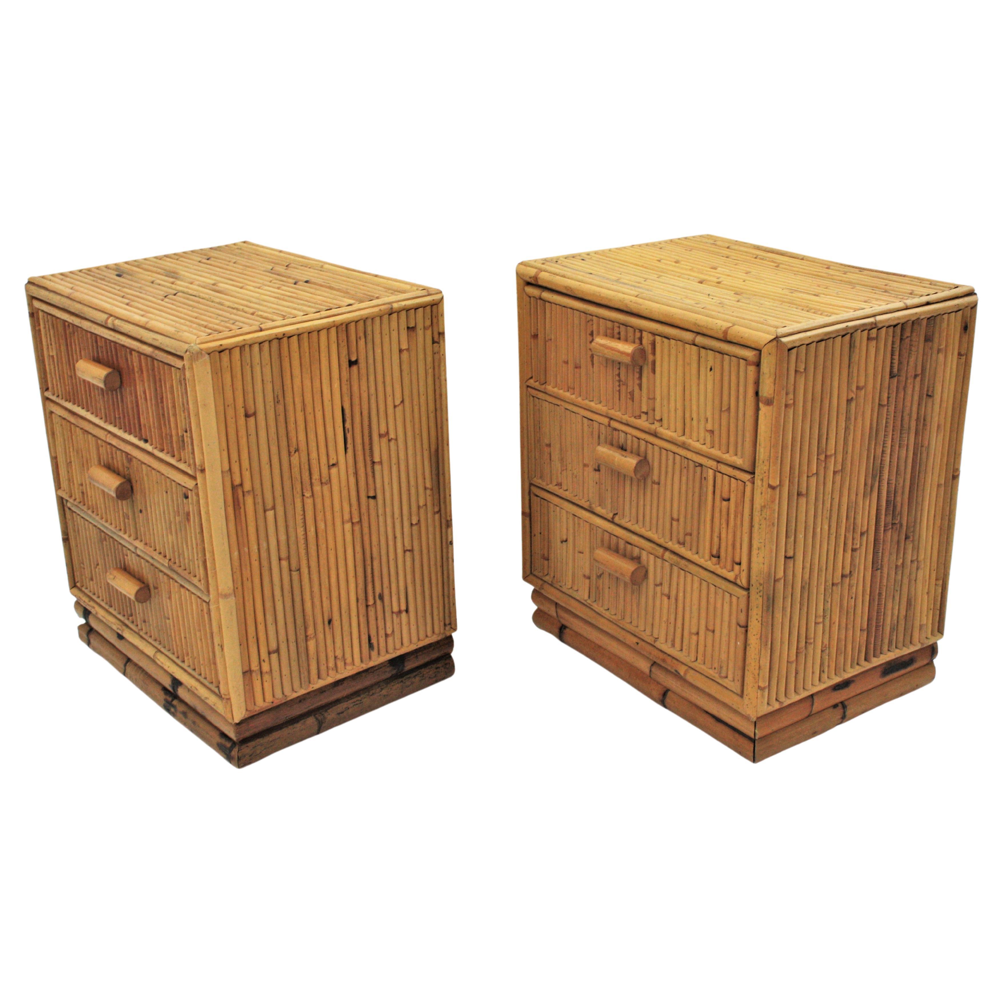 Pair of Spanish modern bamboo three-drawer end table stands or small chests, 1970s. 
Beautiful pair of bamboo small chests, end tables or nightstands.
These small chests of drawers have a wood and bamboo construction. The top, sides and the front
