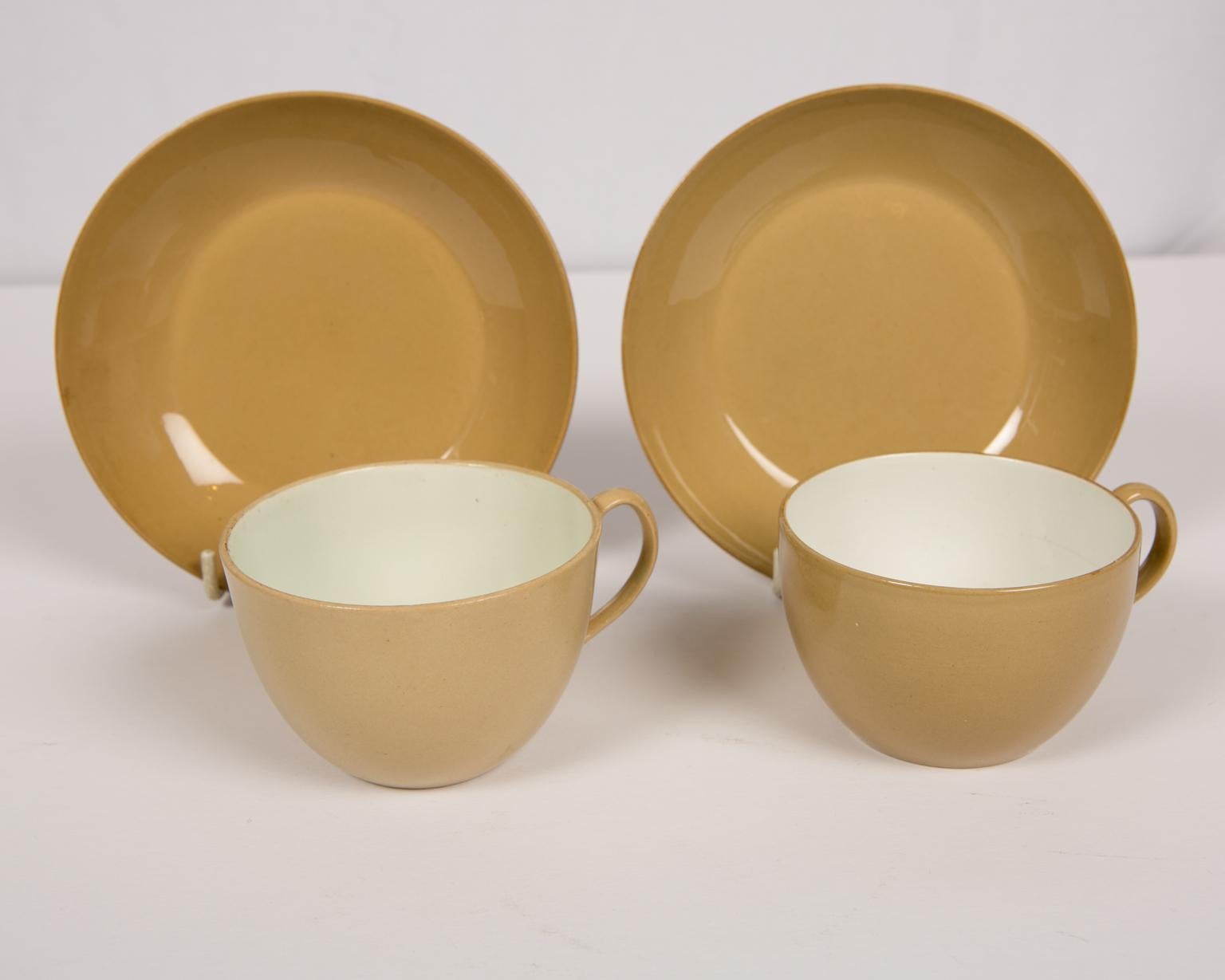 We are pleased to offer this pair of Wedgwood drabware cups and saucers dated circa 1810. Drabware is made with dark clay as compared with other colored earthenware’s, which are made with a white body and then tinted with glazes. Drabware colors