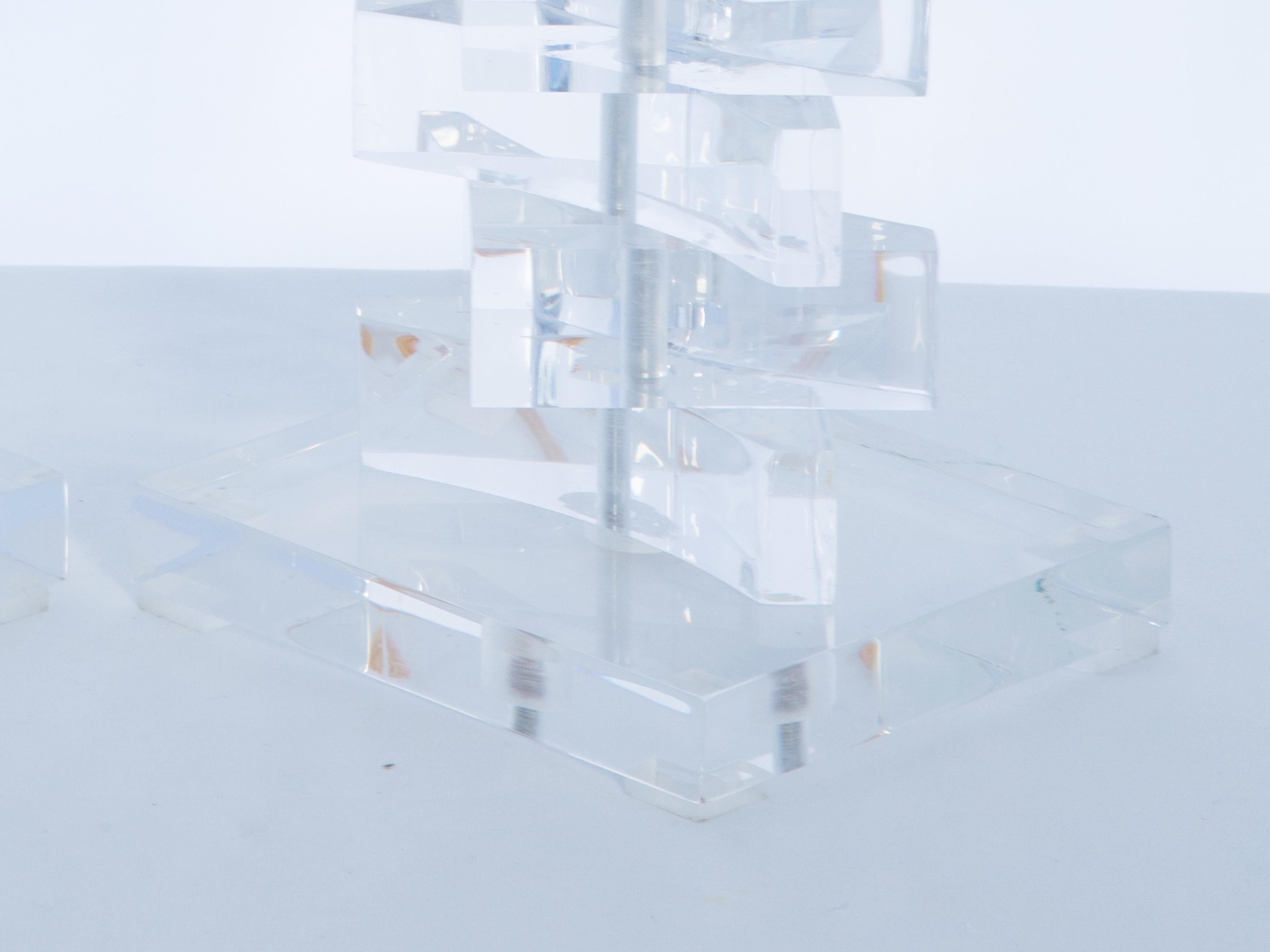 Mid-Century Modern Pair of Springer Style Stacked Triangular Block Lamps of Lucite For Sale