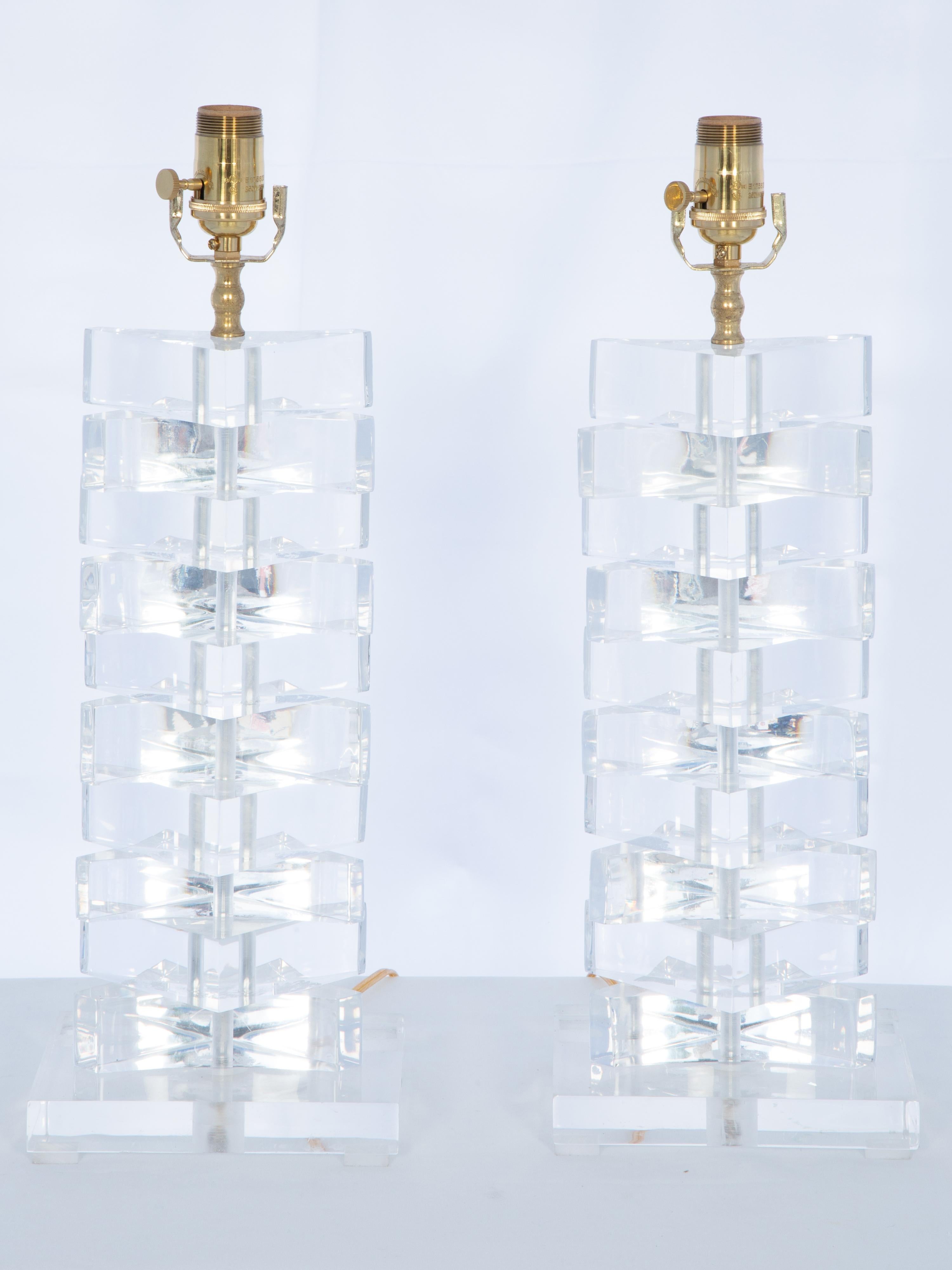 Pair of Springer Style Stacked Triangular Block Lamps of Lucite In Good Condition For Sale In West Palm Beach, FL