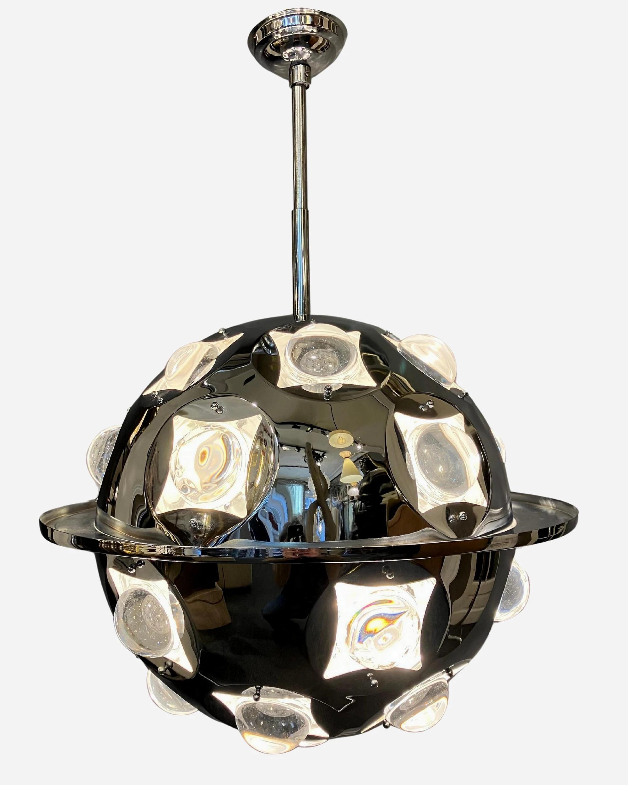 Sputnik chandelier designed by Oscar Torlasco, for LUMI Italy, in the 1960s. Chrome-plated structure with optical glass lenses that reflect light in all directions. In very good original condition.

Price is indicated for each item.