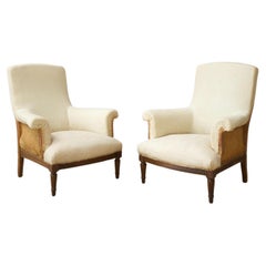 Pair of square back armchairs with carved frame Pair of square back armchairs with carved frame