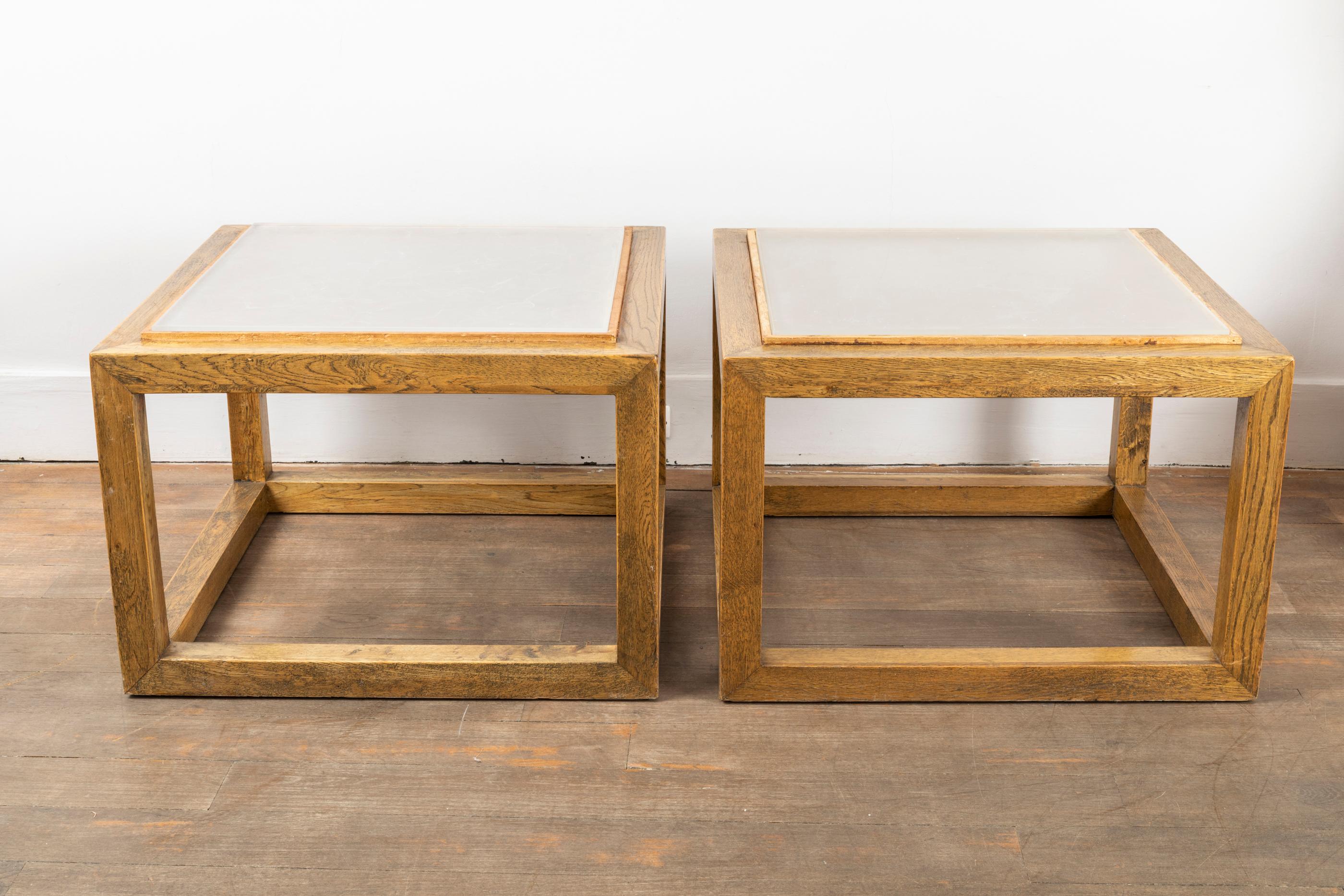 Pair of oak tables with gilded framed glass top. 
The glass top is custom made to imitate rock crystal.
France, circa 1970.

Measures: Height 16.3 inches (41.5 cm)
Width 23.6 inches (60 cm)
Depth 23.6 inches (60 cm).


  