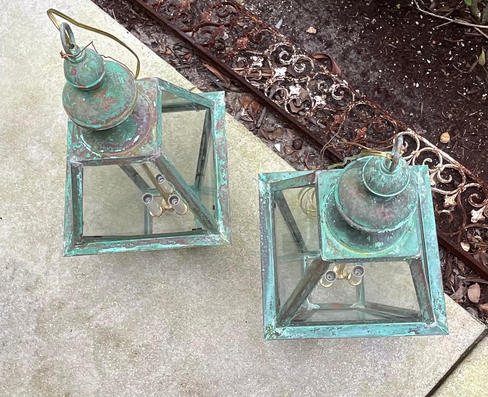 Pair Of Square Handcrafted Copper Hanging Lanterns In Good Condition For Sale In Delray Beach, FL