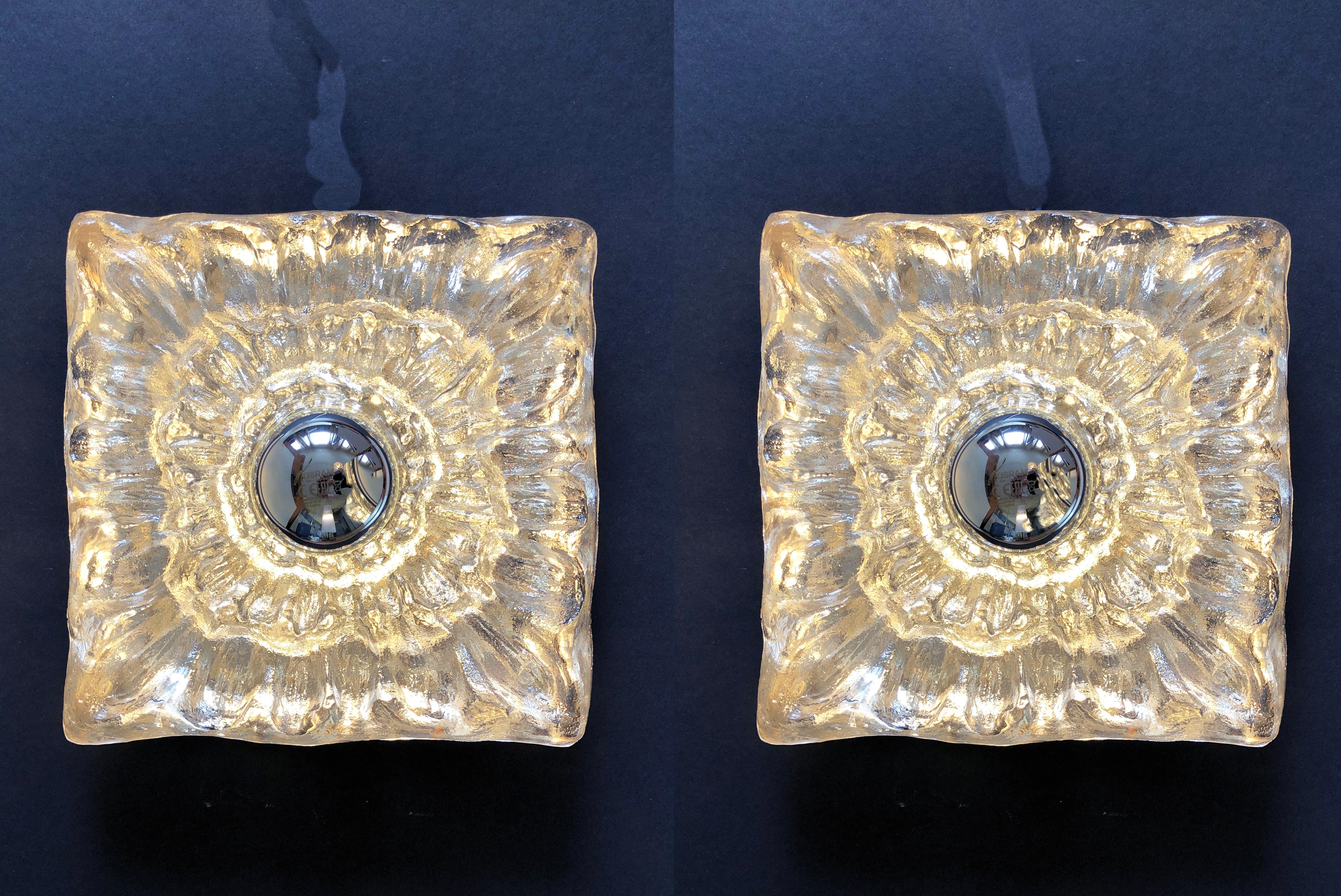 Fantastic wall light or ceiling lamp, attributed to Peill & Putzler, Germany.
Crystal glass, here in the shape of the so-called ''ice glass'': it looks like a light bulb sticking out of a frozen surface with icicles!
Simply wonderful design from the