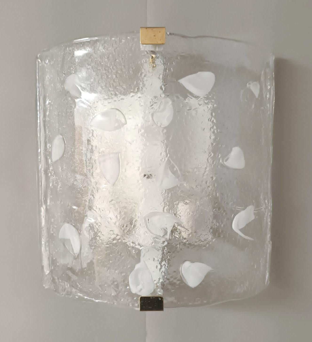 Vintage Italian wall lights with clear curved square Murano glass shades decorated with white colors / Made in Italy by Mazzega, circa 1970s
Height: 12 inches / Width: 12 inches / Depth: 3.5 inches
2 lights / E12 or E14 type / max 40W each
1 pair