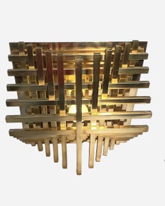 Pair of square sconces in polished brass, by Philippe Jean, France, circa 1970