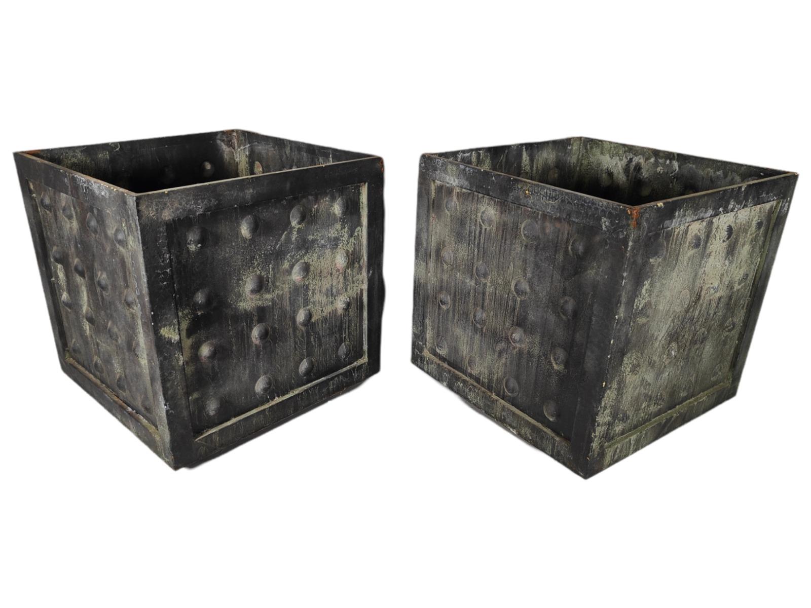 Pair of square-shaped zinc pots decorated with hemi-spheres on the surface. 1950s. Measures: 46X46X44 CM
good condition.