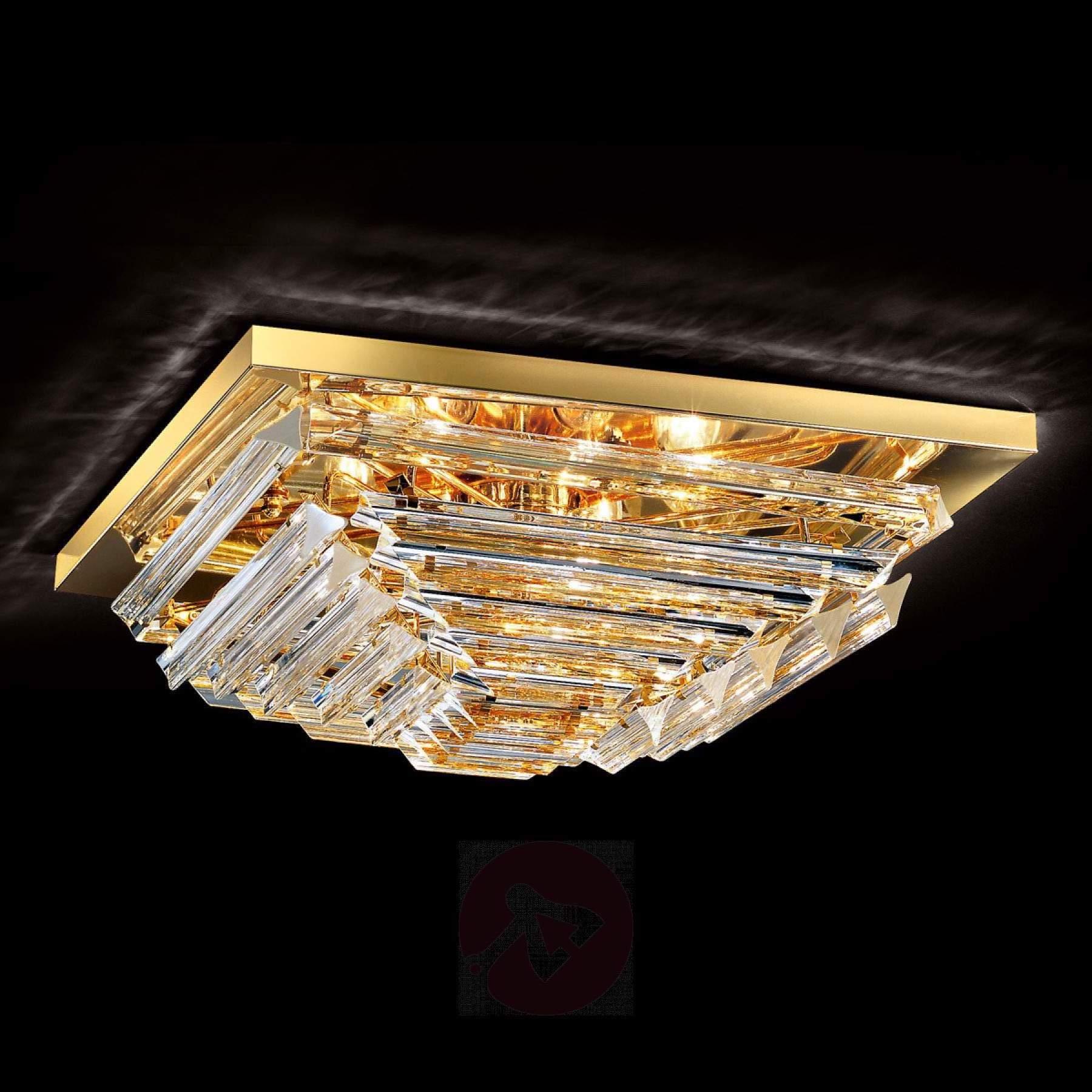 Gorgeous contemporary square ceiling light with clear triedi Murano glasses on gold-plated square frame.
Available four pairs and also a pair of sconces.
Four E 14 light bulbs. We can wire for your country standards.
 This light fixture can be