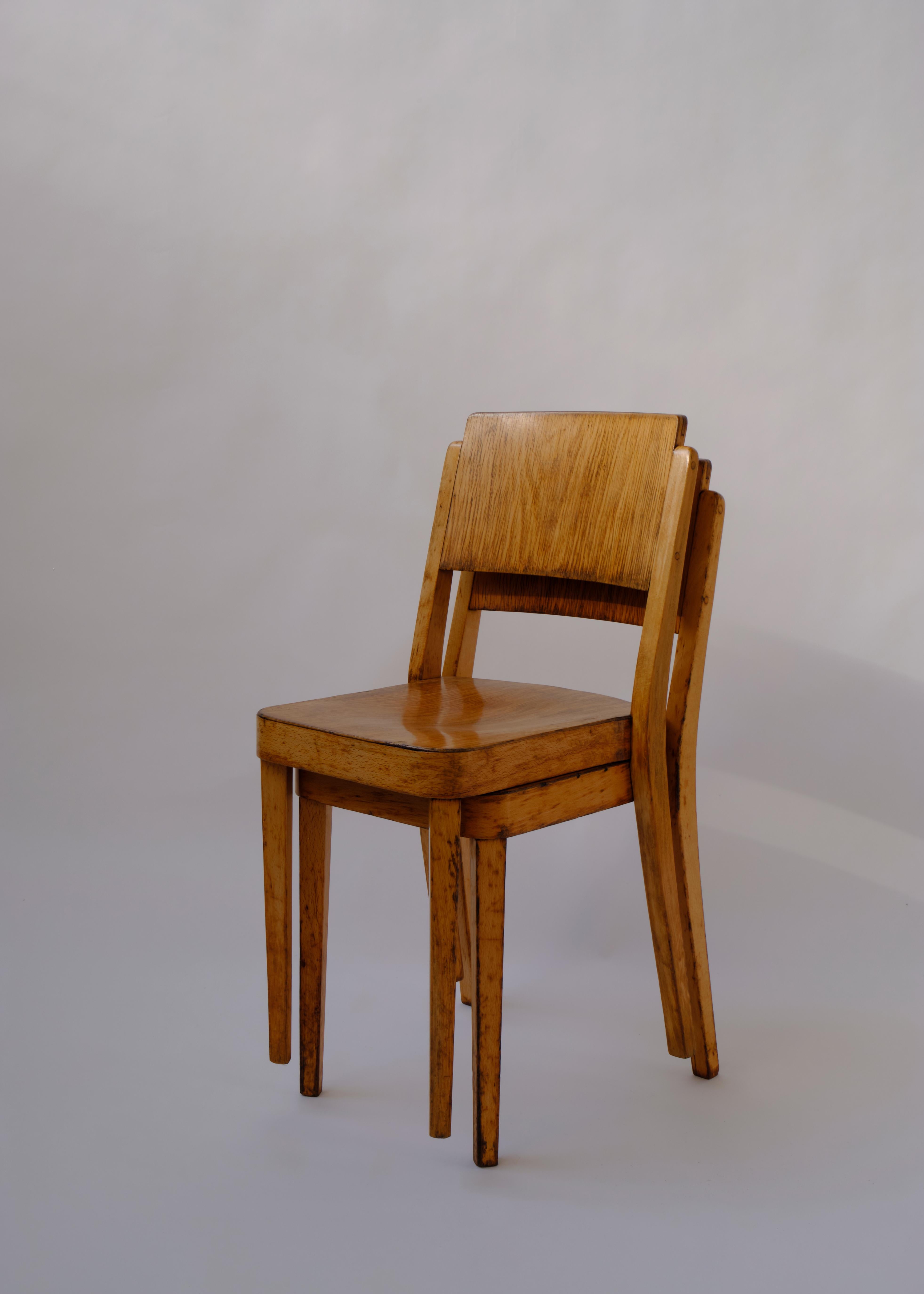 Thonet’s Montana Chair, model number A 1250 fabricated from solid birch and plywood.  Light and stackable design.

Sold as a pair.

The label on both chairs was first used in 1922 and the chairs can be seen in Thonet’s catalogue from 1930 placing