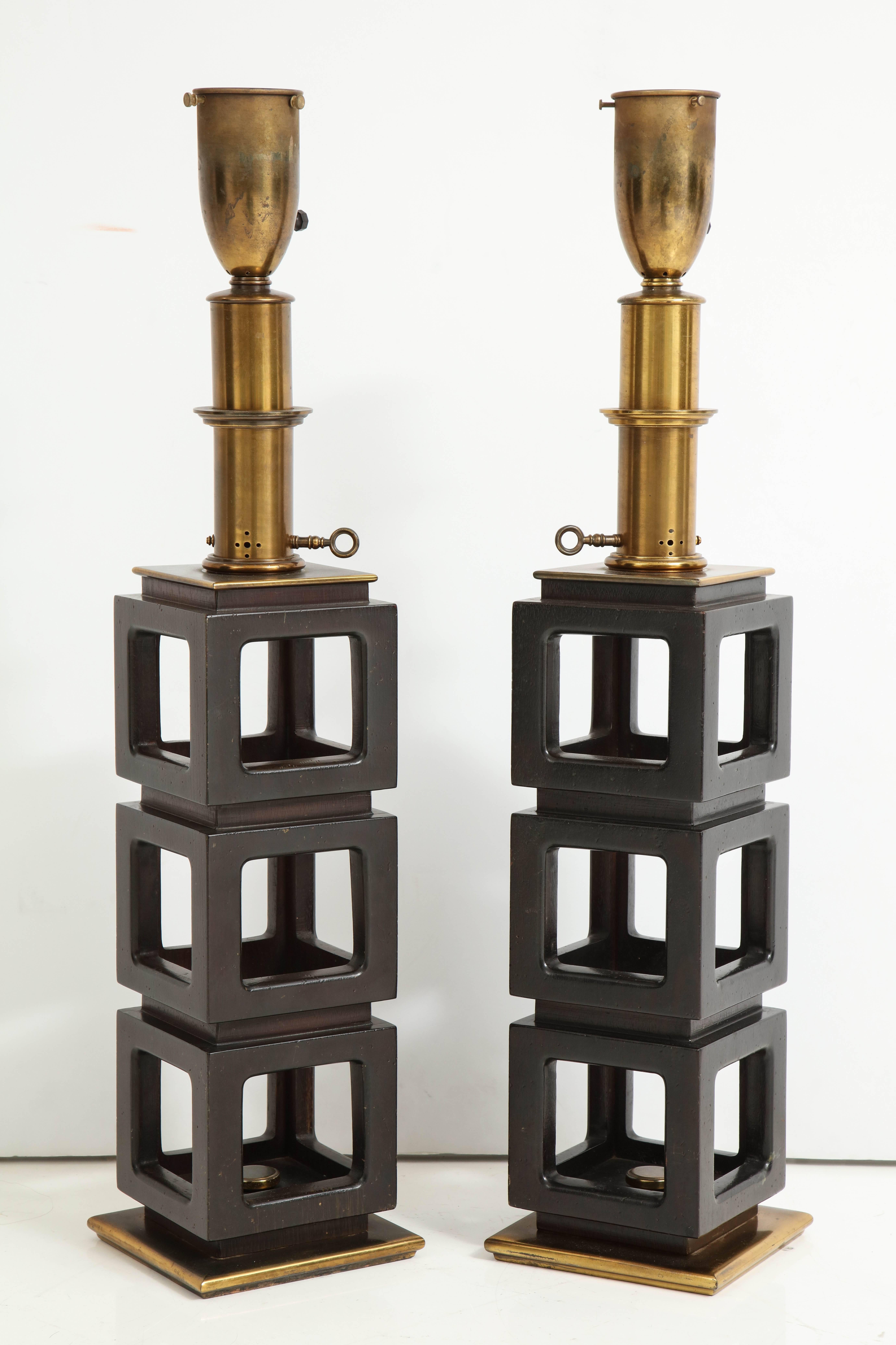 Large pair of stacked cubes lamps by Steiffel, Mahogany body on brass base with original fitting. Can be custom rewired on request.
Sold as a pair.
