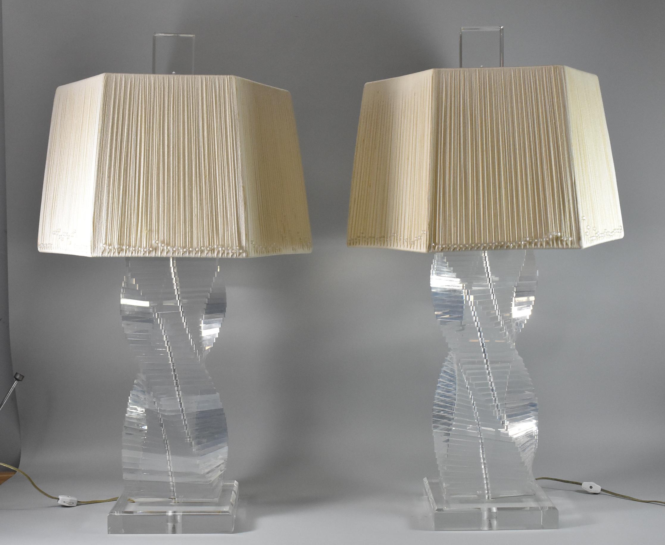 Pair of stacked Lucite helix table lamps with 2 sockets and switch on the cord. The hexagonal string shades are covered with unique beaded slim cords; clear beads slide up and down on the cords. 32