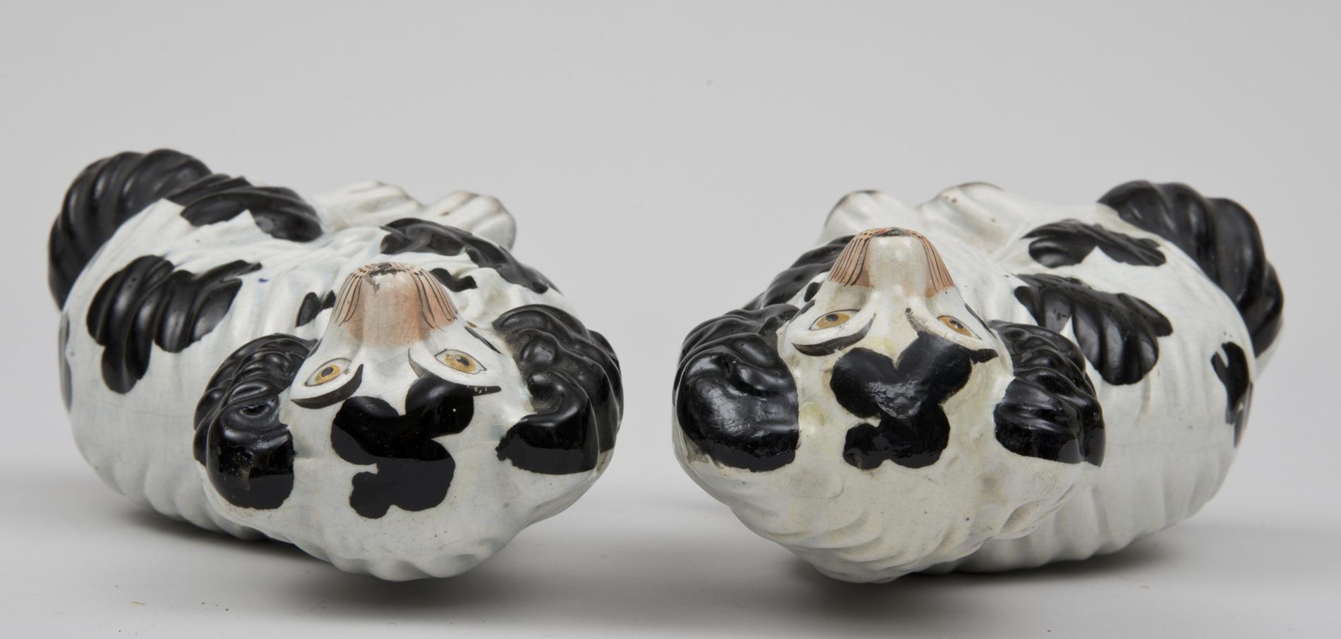 Molded Pair of Staffordshire Black and White Dogs For Sale
