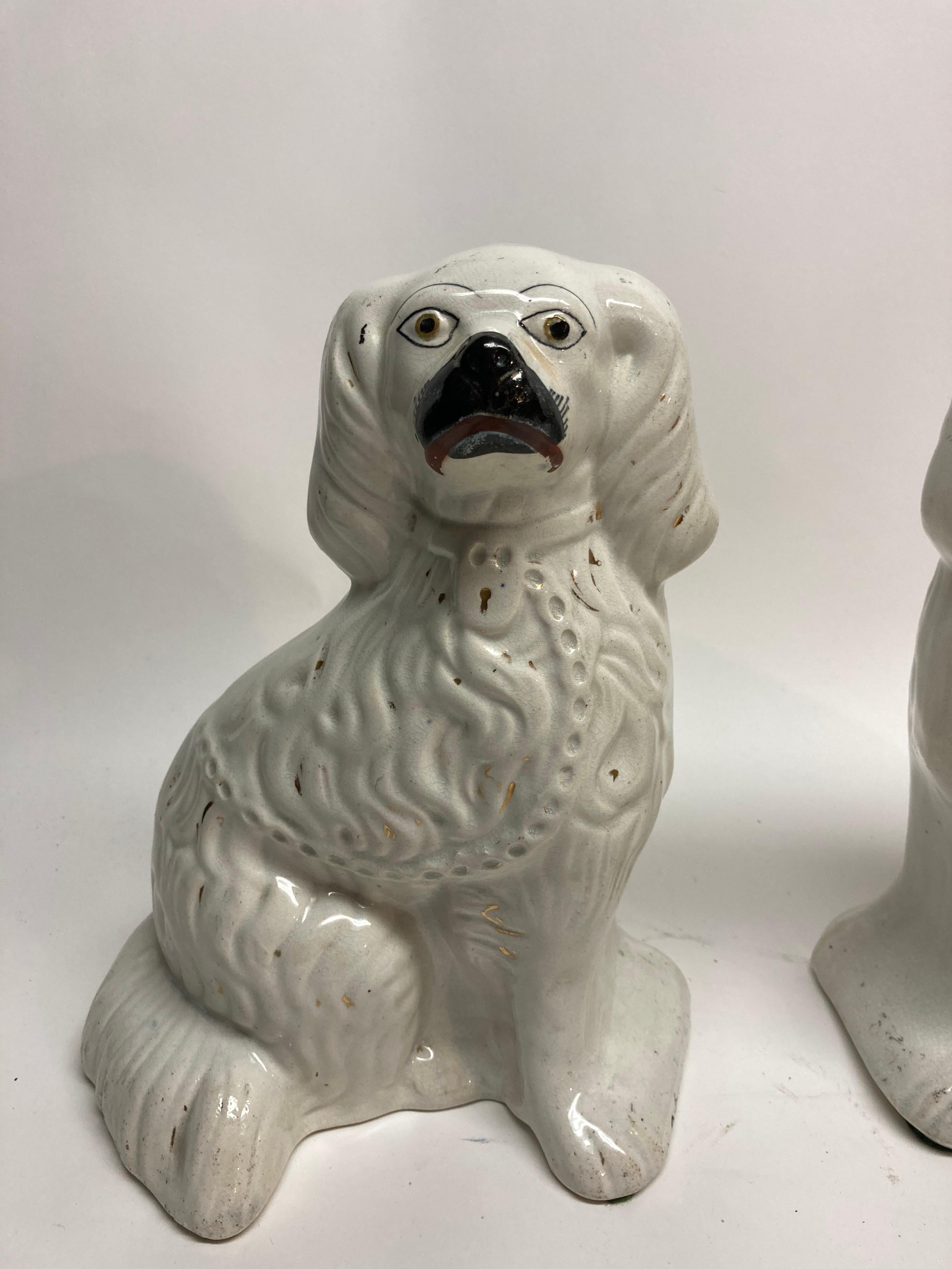 A very nice pair of Staffordshire spaniels.