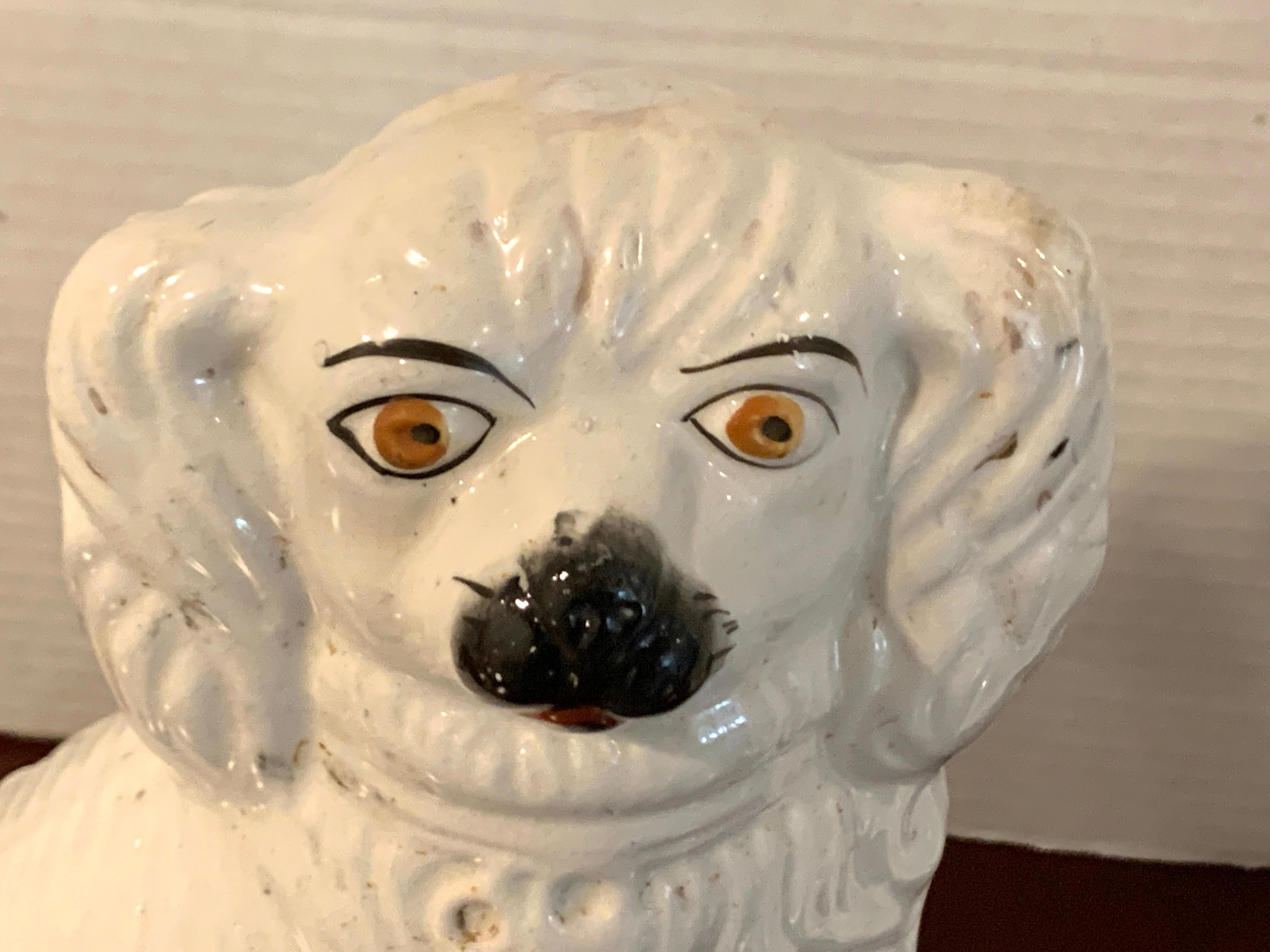 Pottery Pair of Staffordshire Dogs, in White