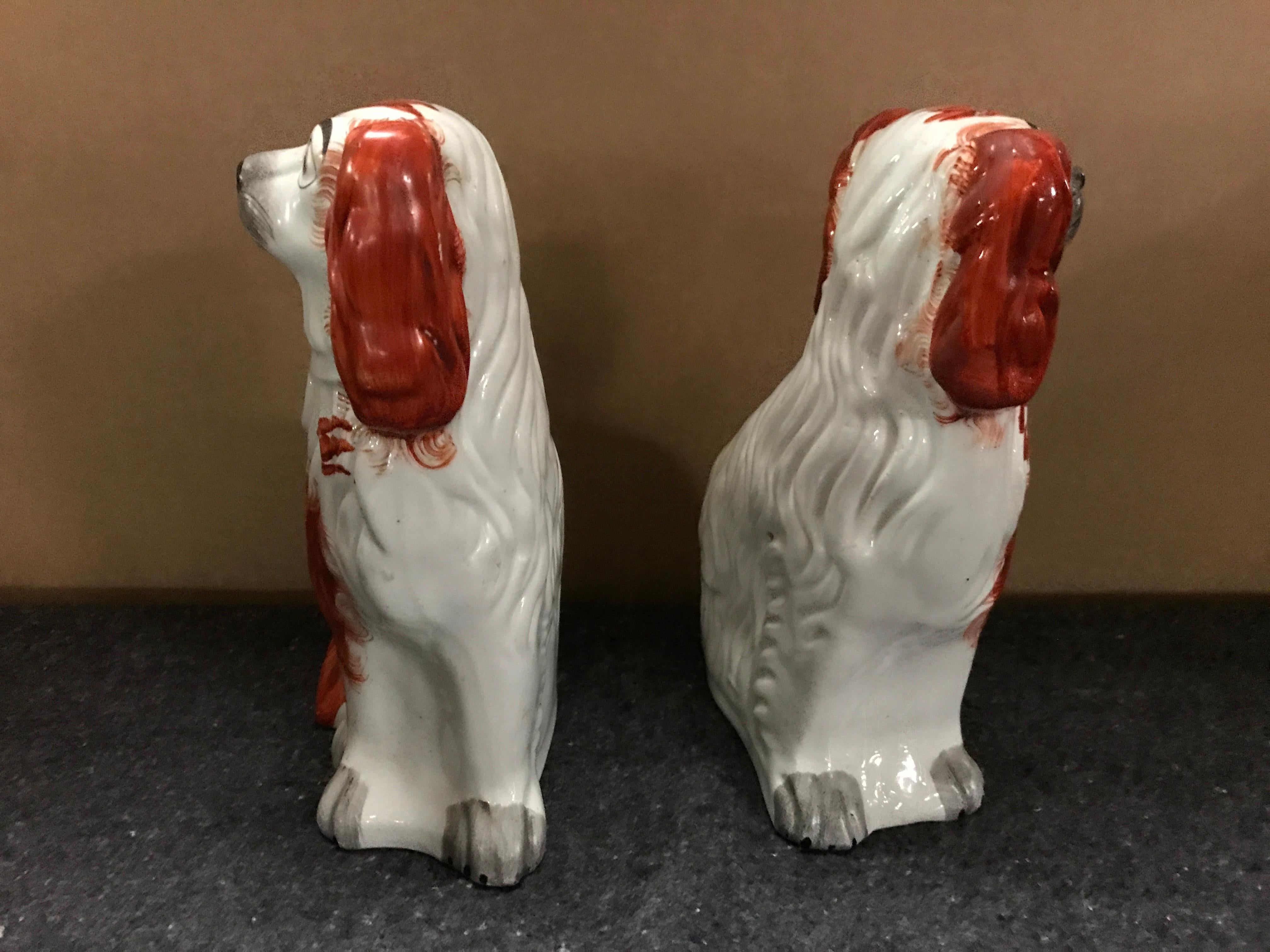 English Pair of Staffordshire England Red Seated Spaniel Dogs For Sale