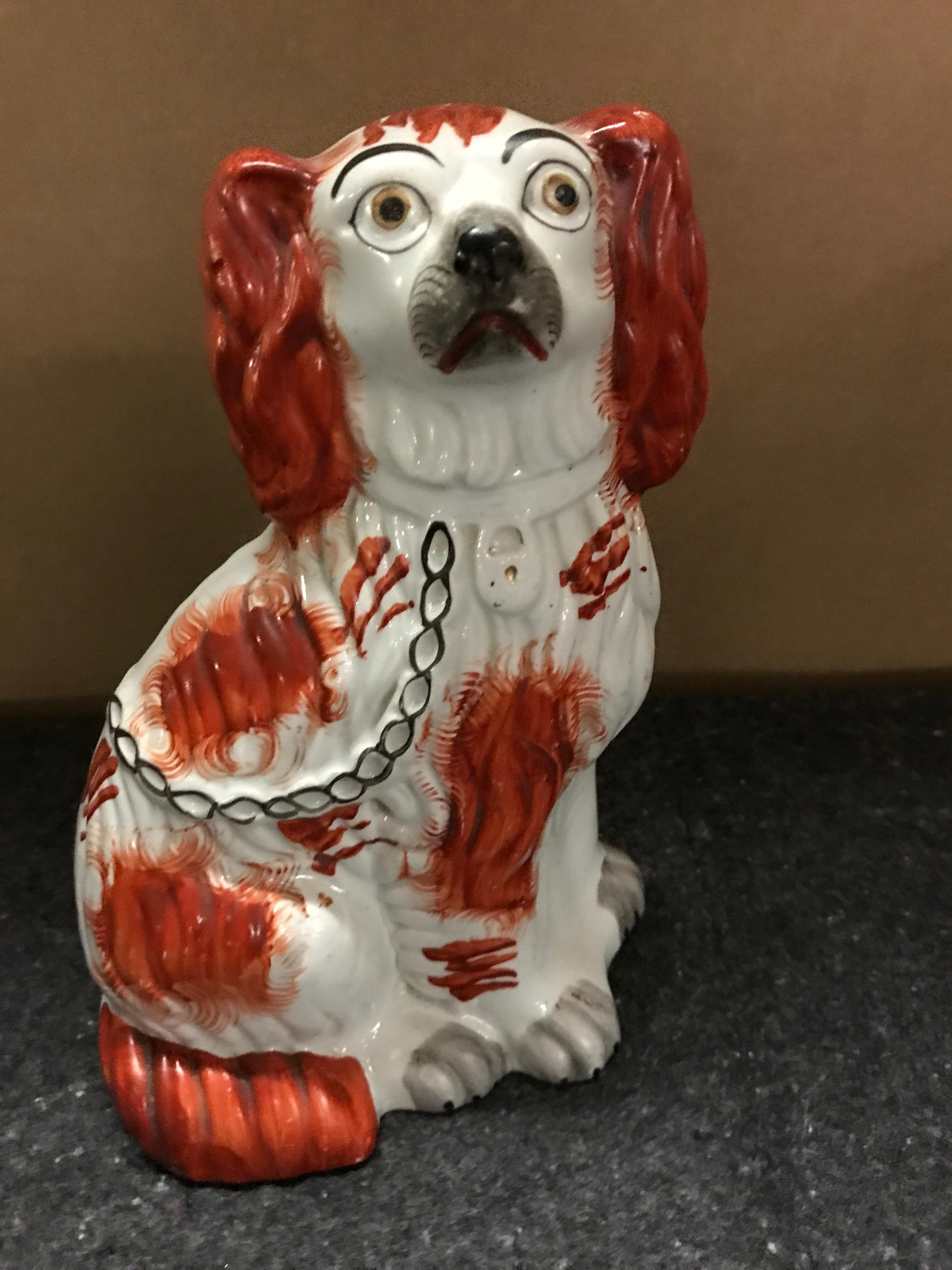 Pottery Pair of Staffordshire England Red Seated Spaniel Dogs For Sale