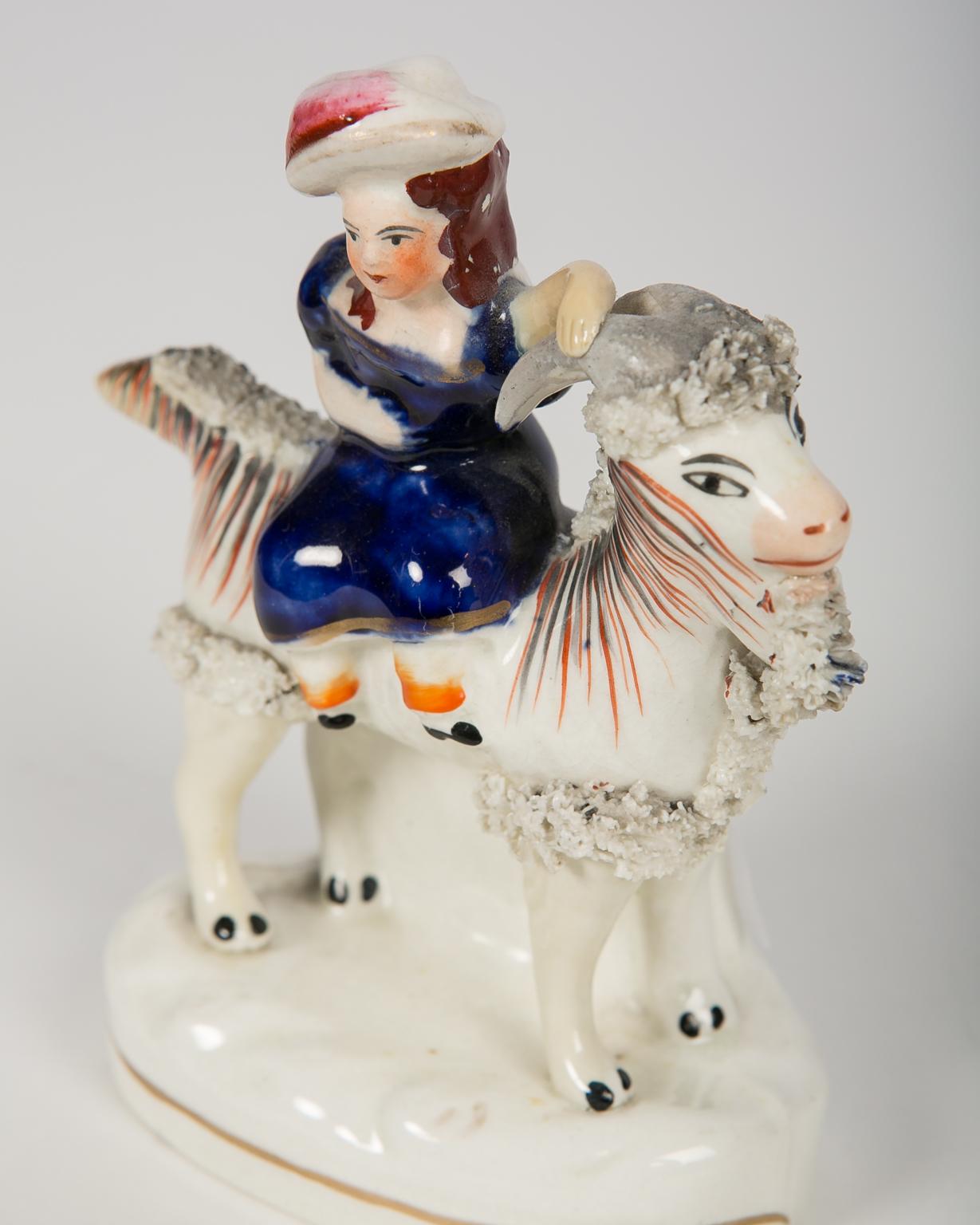 English Pair Staffordshire Figures of Children Riding Goats circa 1880