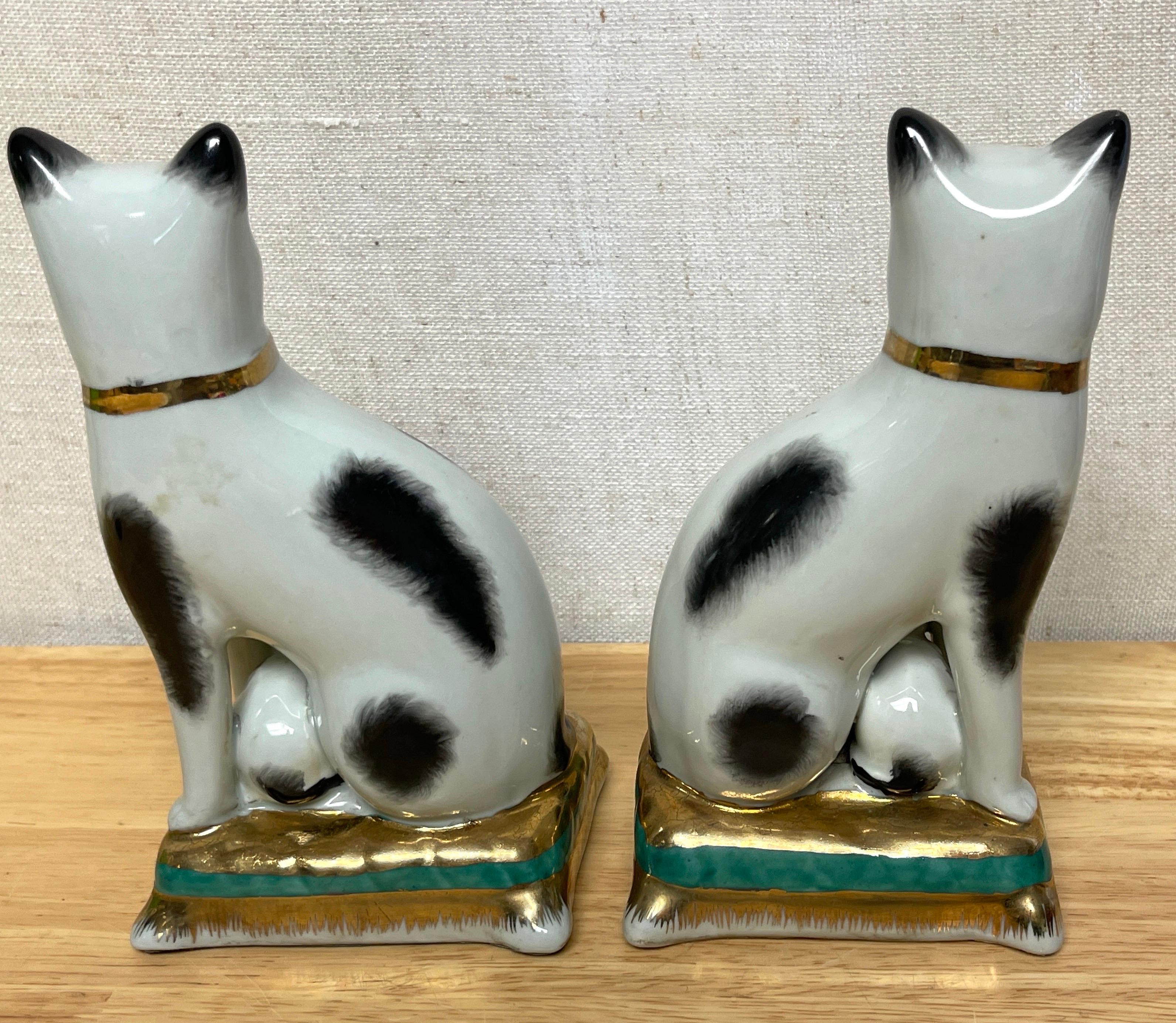 Gilt Pair of Staffordshire Figures of Seated Black & White Cats with Kittens