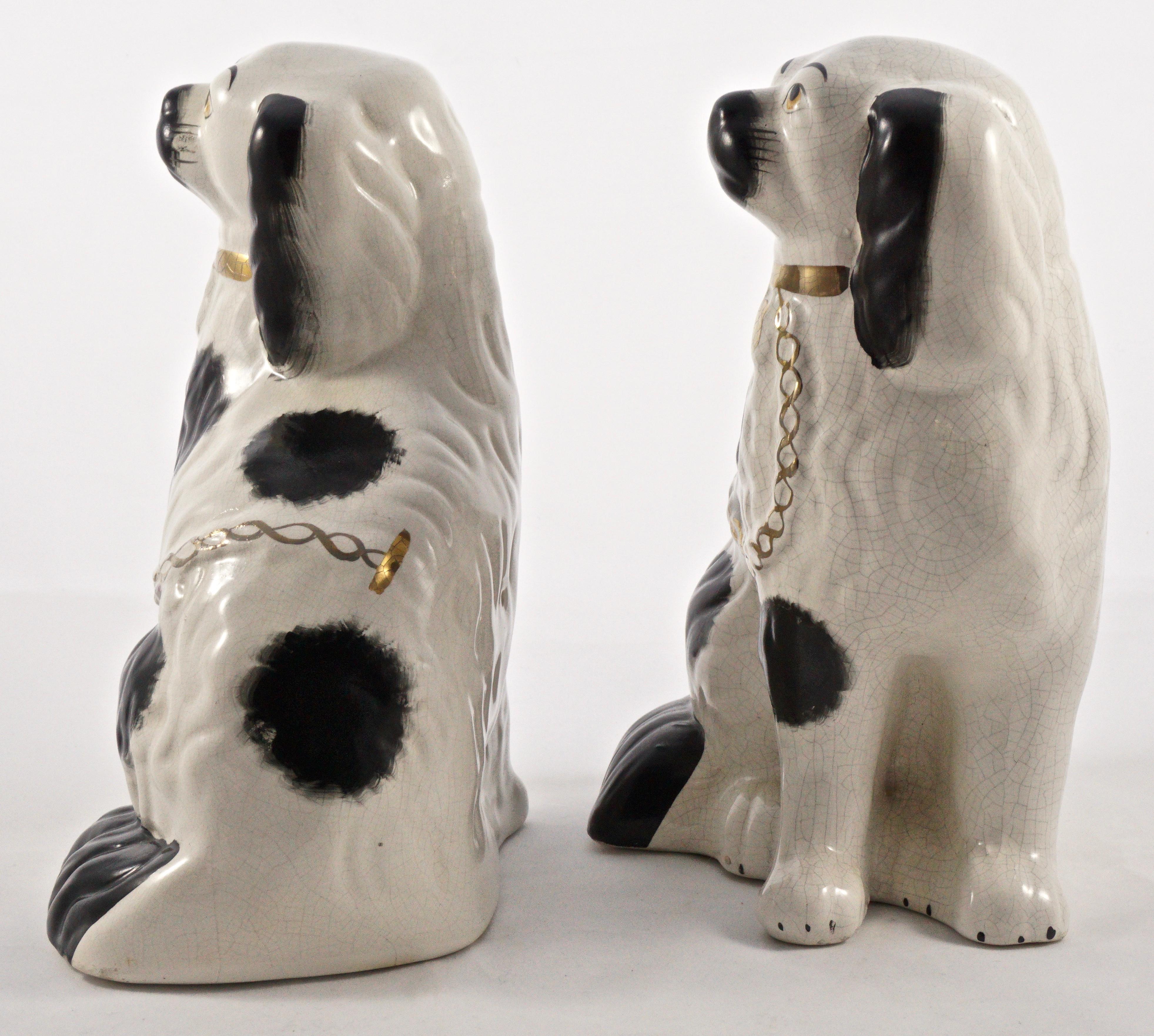 Pair of Staffordshire Hand Painted Black and White Pottery Dog Figurines In Good Condition In London, GB