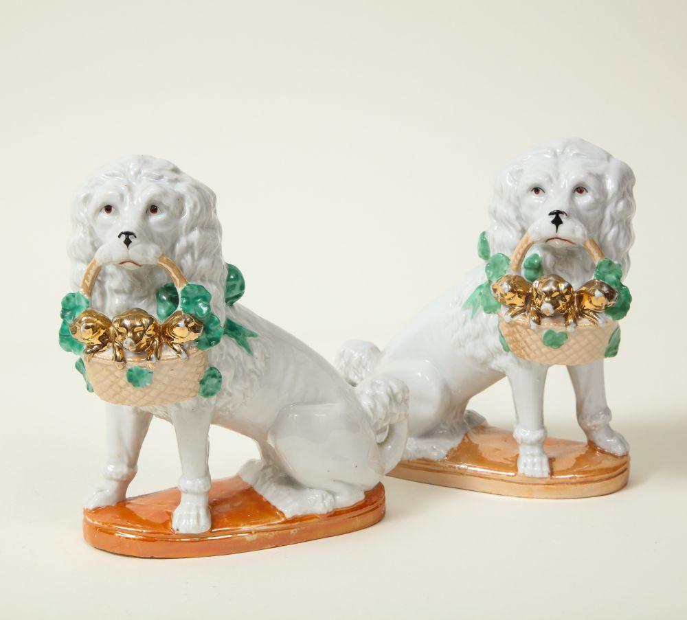 British Pair of Staffordshire Porcelain Dogs with Gilt Basket of Pups For Sale