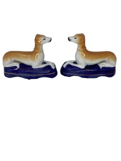 Pair of Staffordshire Pottery Greyhound or Whippets