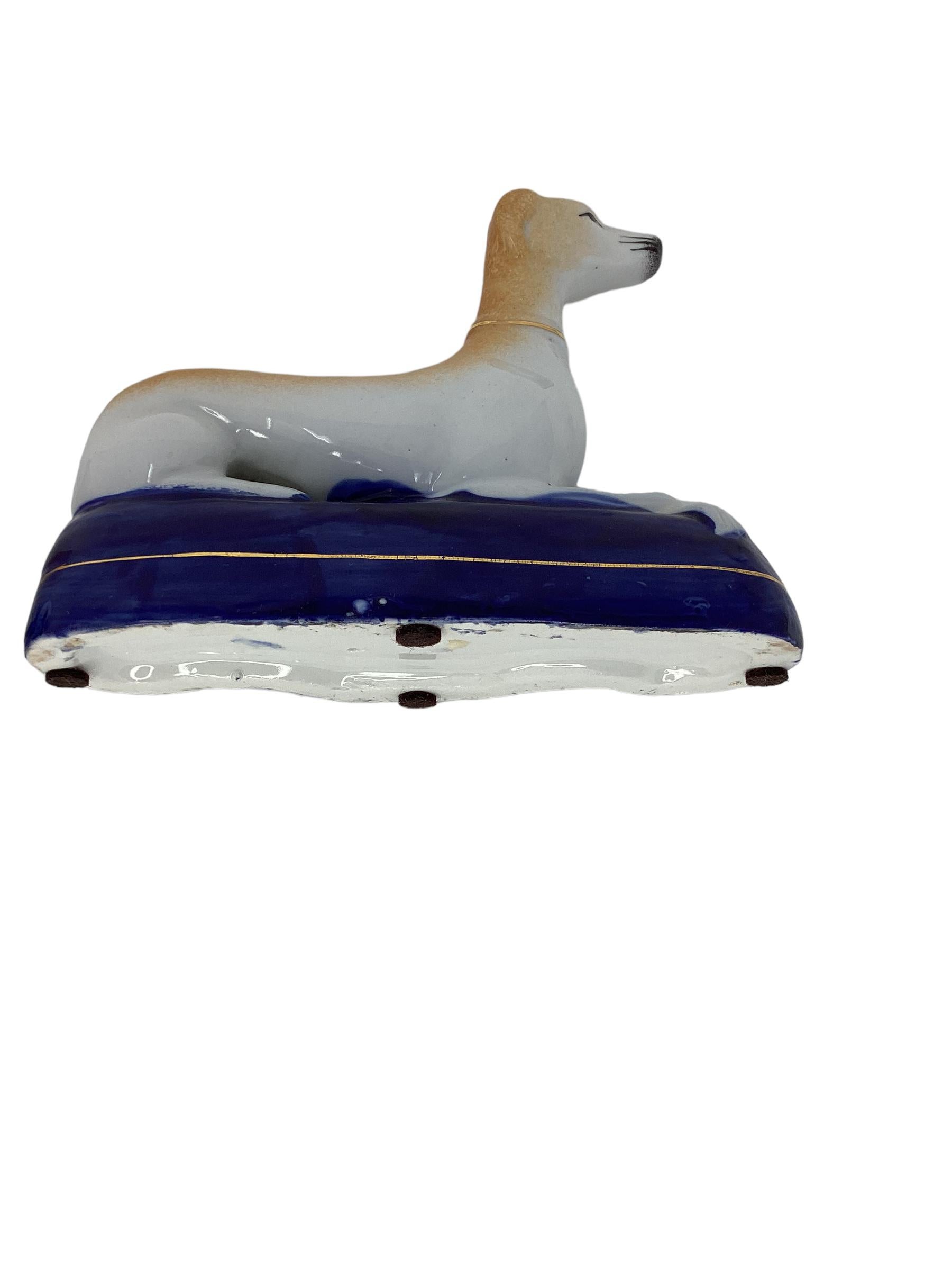 Early 20th Century Pair of Staffordshire Pottery Greyhound or Whippets
