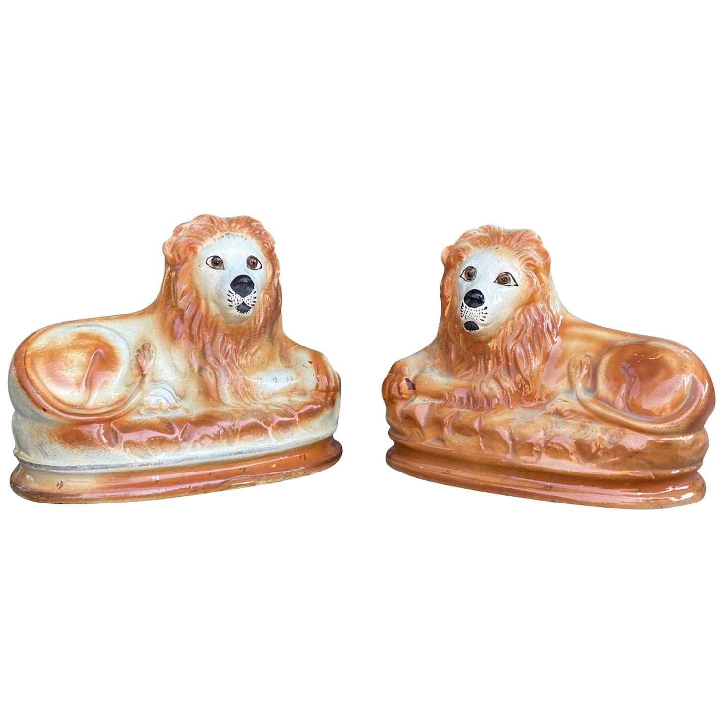Pair of Staffordshire Pottery Lions