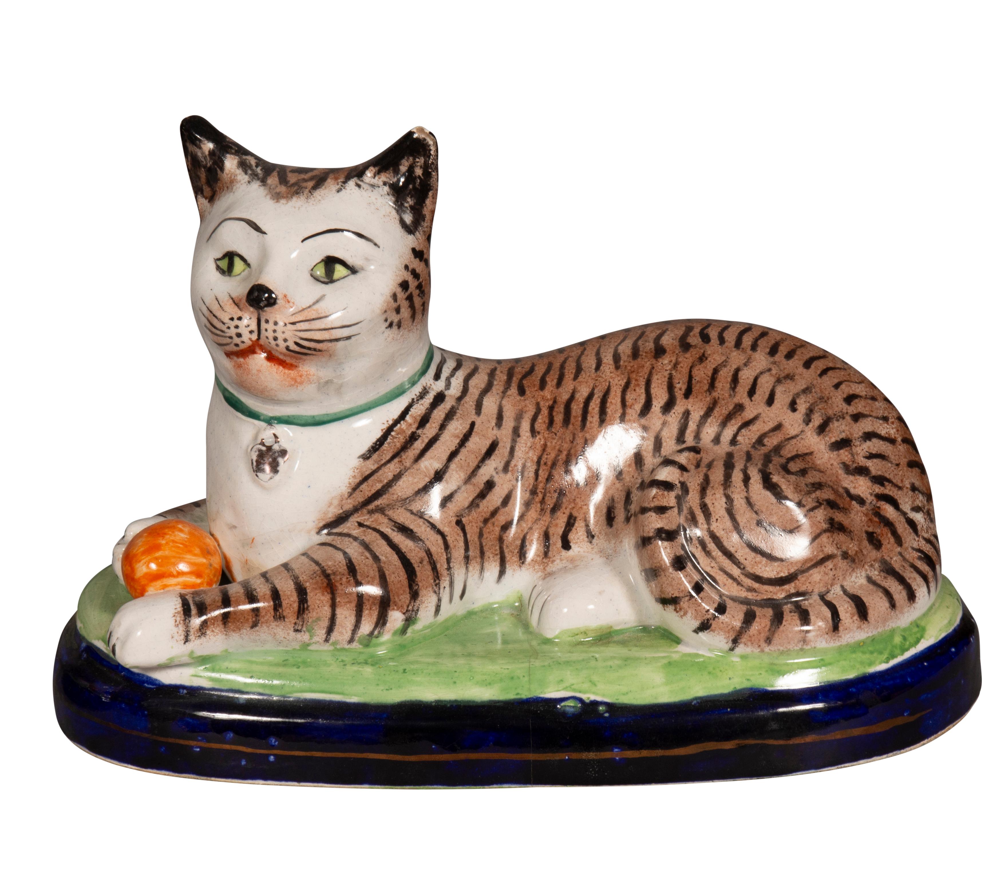 Pair Of Staffordshire Pottery Reclining Cats In Good Condition For Sale In Essex, MA