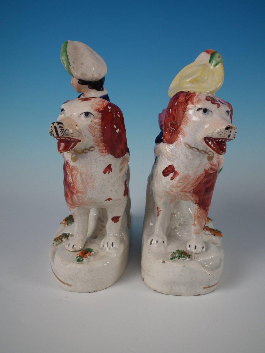 Mid-19th Century Pair of Staffordshire Royal Children on Spaniels