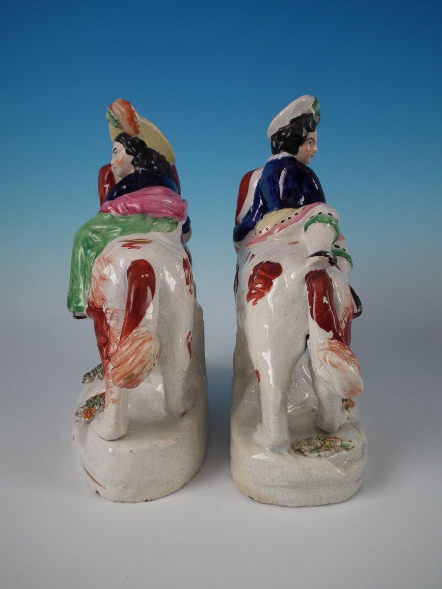 Pair of Staffordshire Royal Children on Spaniels 1