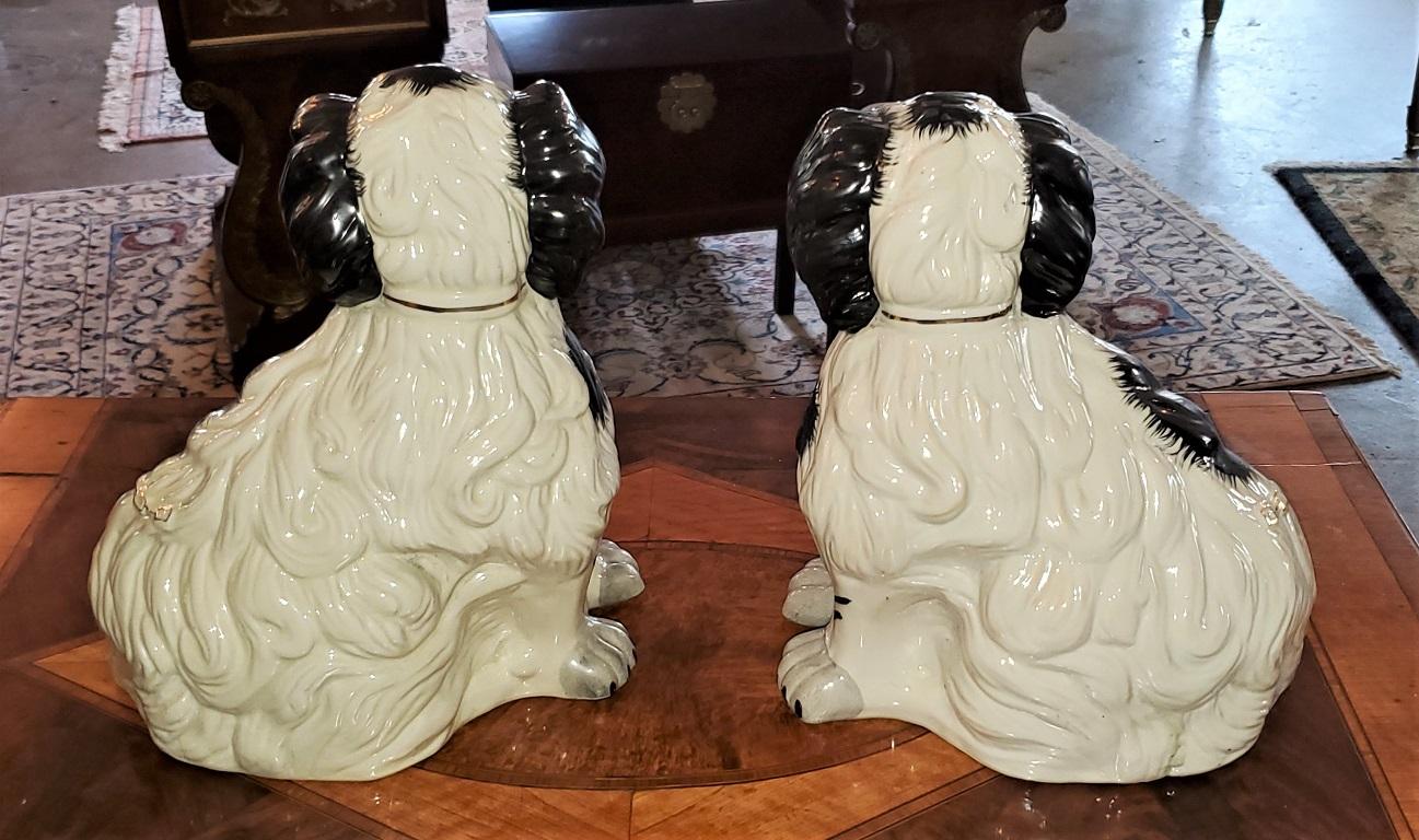 Pair of Staffordshire Style Ceramic Spaniels 1