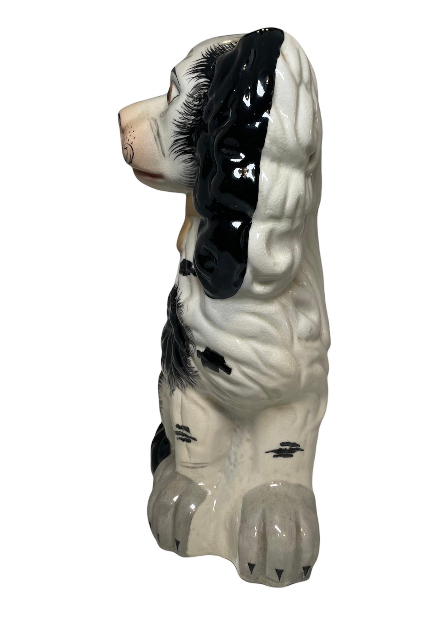 20th Century Pair of Staffordshire Style Pottery King Charles Dogs