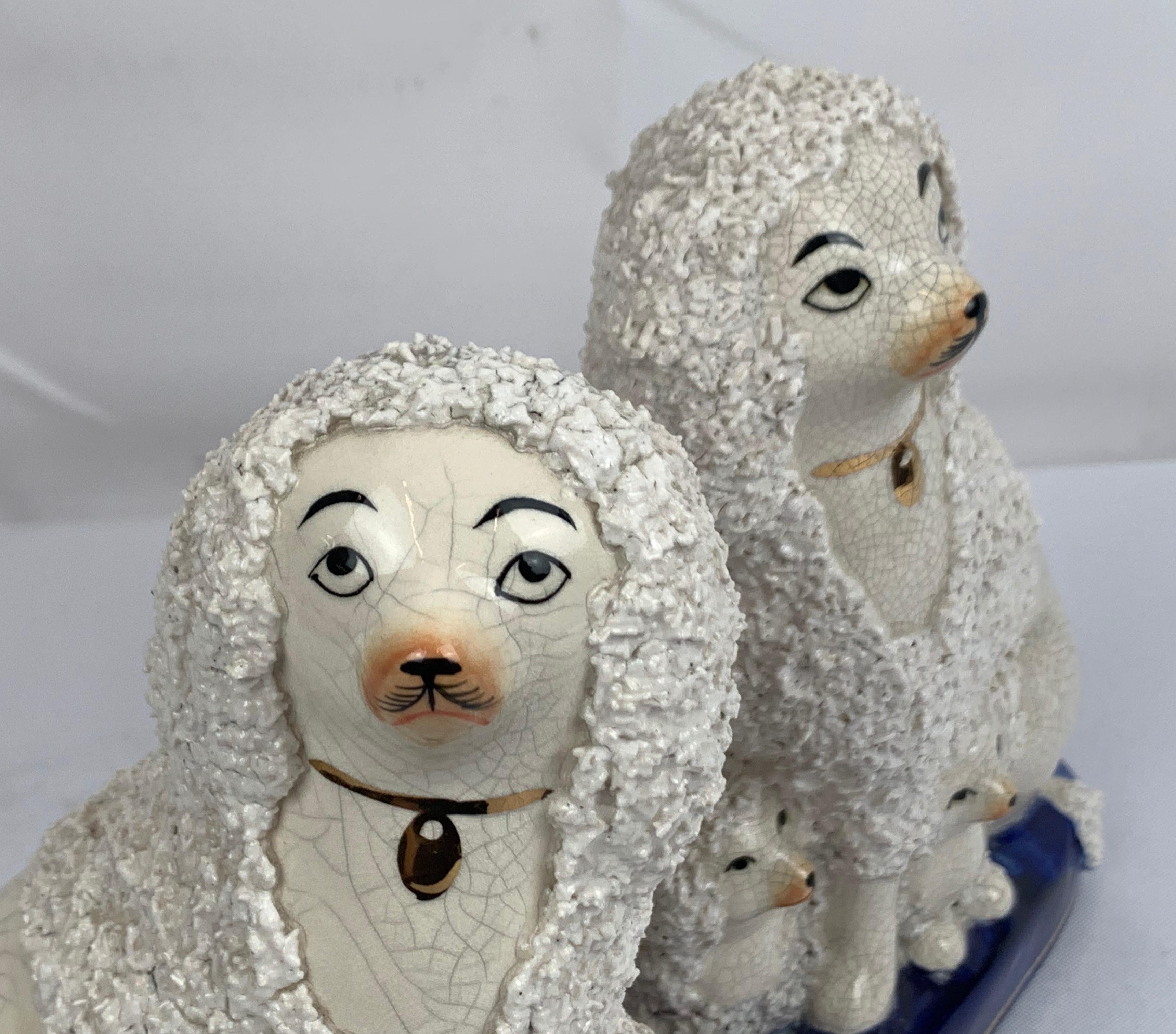 Victorian Pair of Staffordshire White Poodles on Cobalt Blue Bases