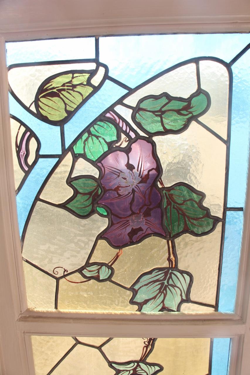 Pair of stained glass windows of Jacques Gruber Art Nouveau era mounted on wooden frame from a large Nancy master house two three fears in the glasses reported but remains can visible, an old restoration in a flower measure frame included.