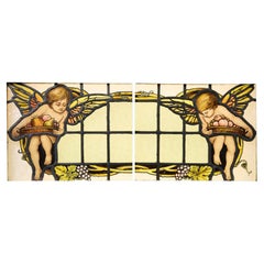 Antique Pair of Stained Glass Panels of Putto
