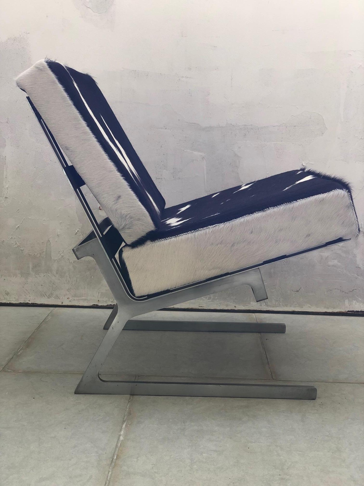 Pair of Stainless Steel and Cowhide Lounge Chairs 4