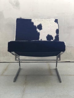 Pair of Stainless Steel and Cowhide Lounge Chairs