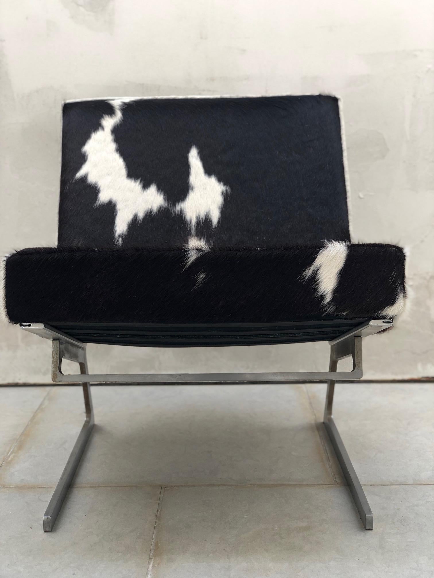 Pair of Stainless Steel and Cowhide Lounge Chairs 1