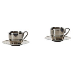 Pair of stainless steel espresso cups and saucers - UK, 20th century