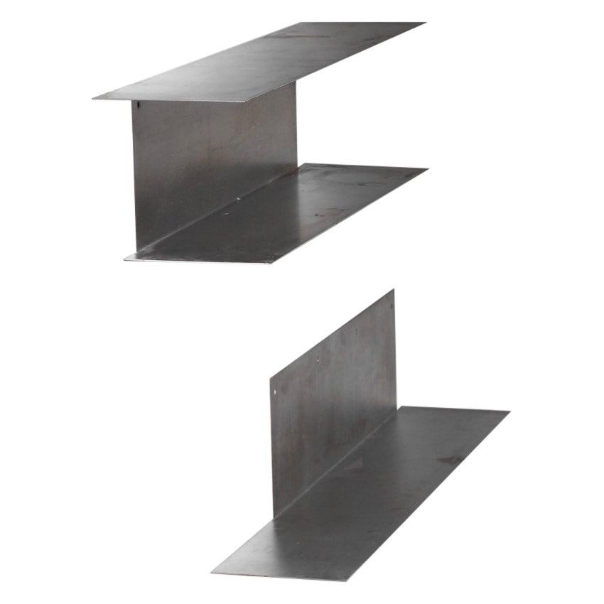Pair of stainless steel wall-mounted bookshelves from the 1970s For Sale
