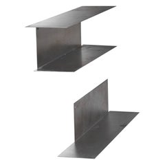 Pair of stainless steel wall-mounted bookshelves from the 1970s