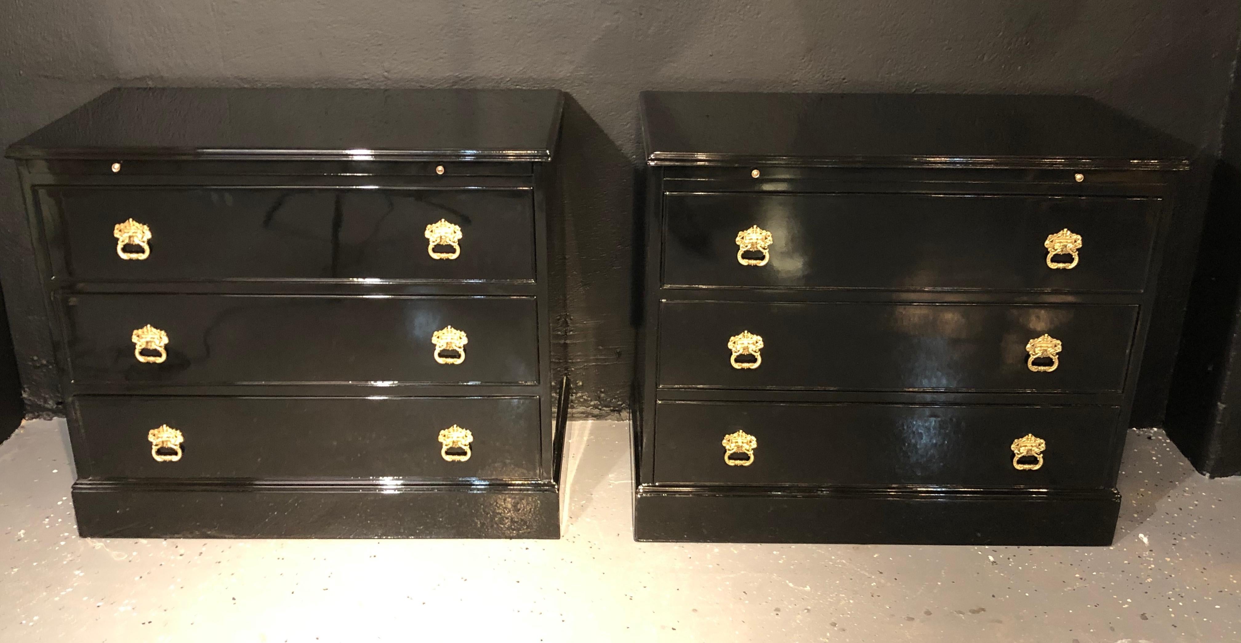 Pair of stamped JANSEN ebony commodes, nightstands or chests. Hollywood Regency pair of ebony lacquered chest. Each having a pullout / pull-out writing tray atop three large deep drawers with oak secondary’s supported by a bracket base. The drawers